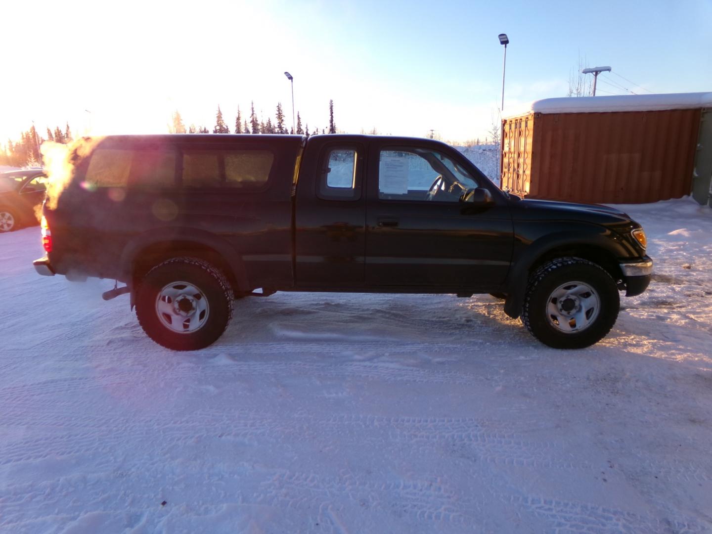 2003 Black /Tan Toyota Tacoma Base (5TEWN72N23Z) with an 3.4L V6 DOHC 24V engine, 5-Speed Manual transmission, located at 2630 Philips Field Rd., Fairbanks, AK, 99709, (907) 458-0593, 64.848068, -147.780609 - Photo#2